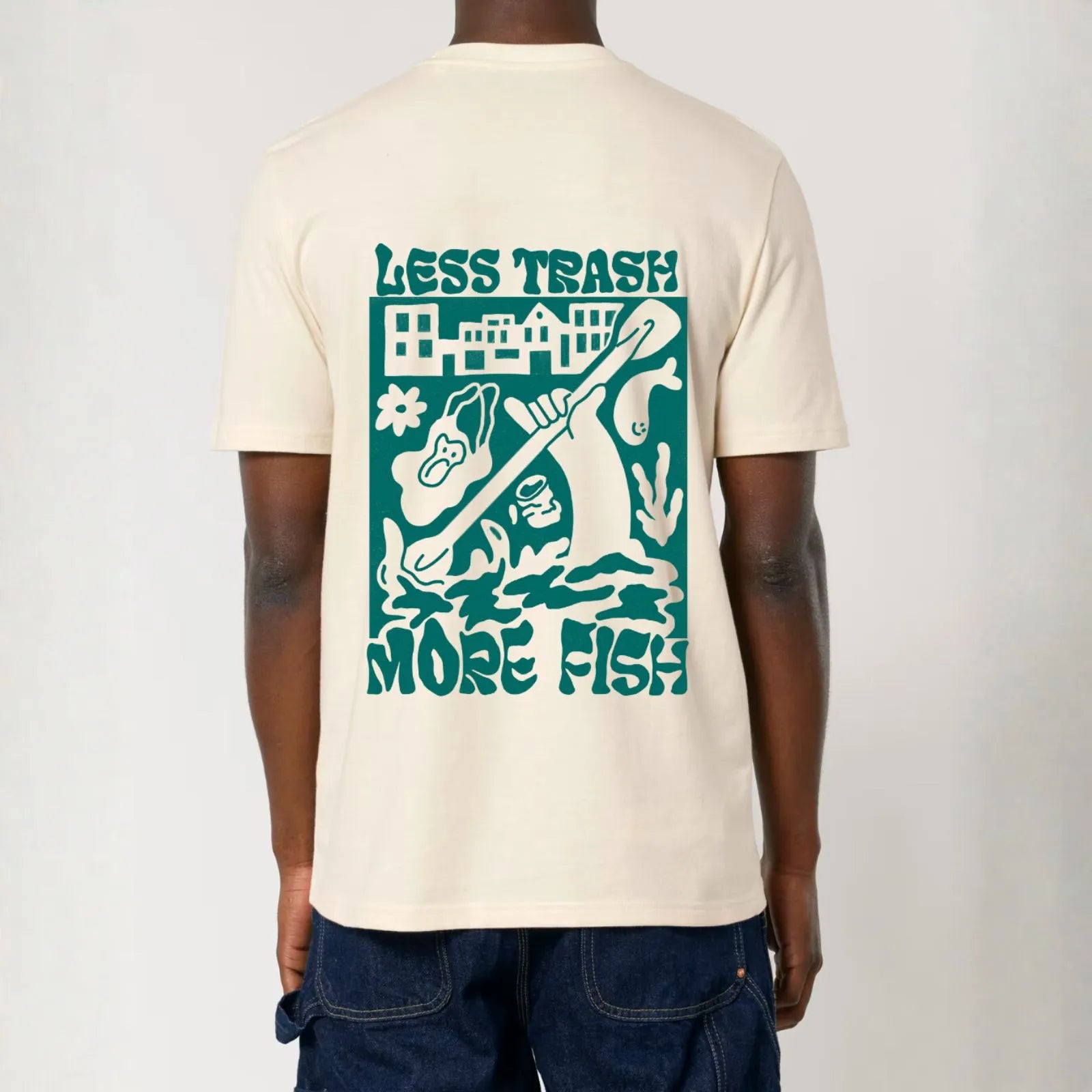 A man wearing unisex City to Ocean T-shirt with 'Less Trash More Fish' graphic design on the back. 100% Cotton in natural raw white, untreated sustainable fabric
