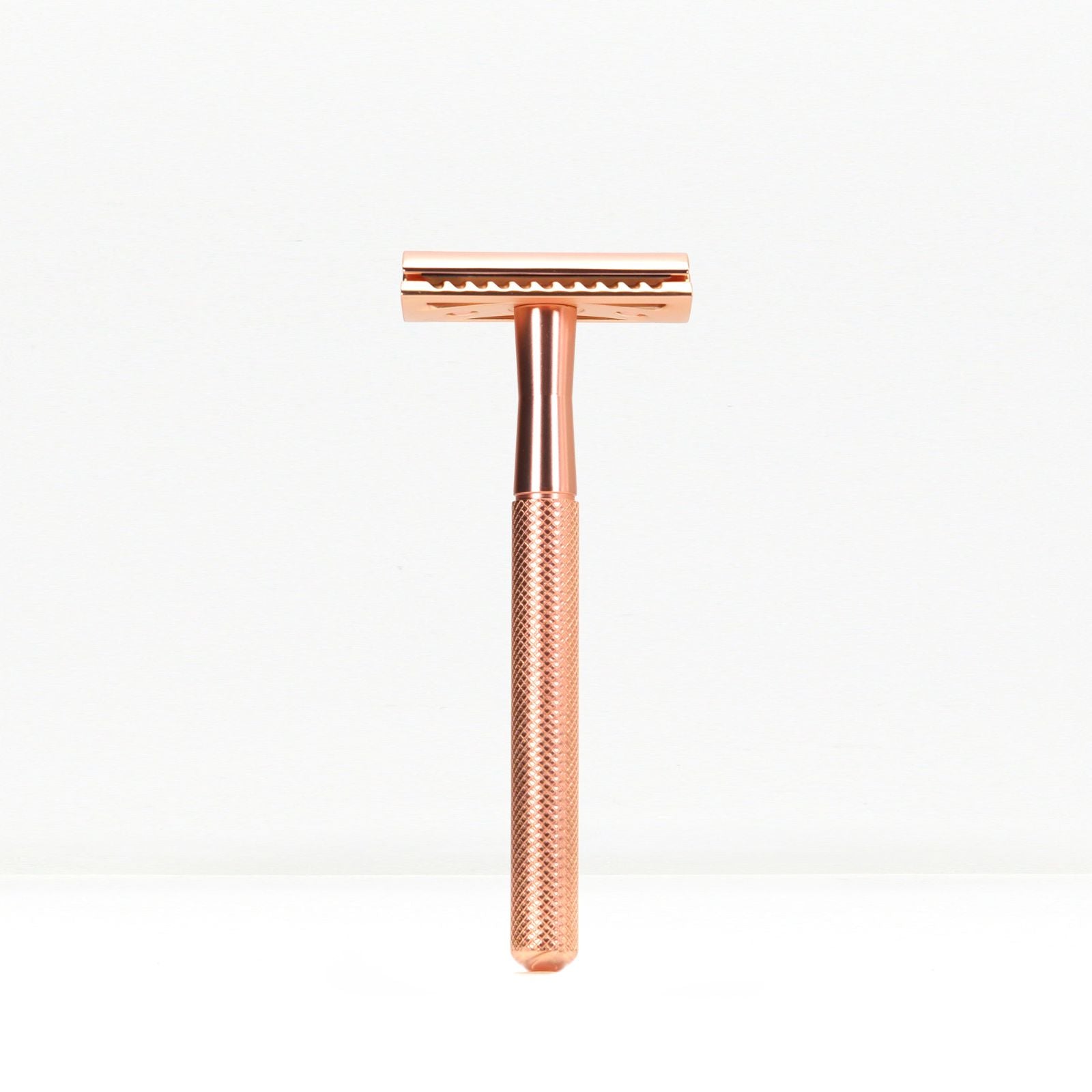Bambaw Rose gold safety razor on a white background